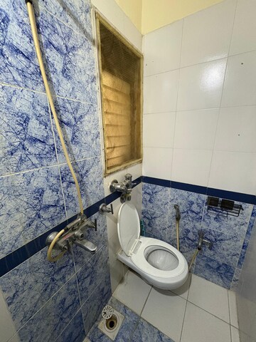 Bathroom in 2 BHK Apartment at Ani Anu Sri Balaji Enclave, Malad West – for Rent