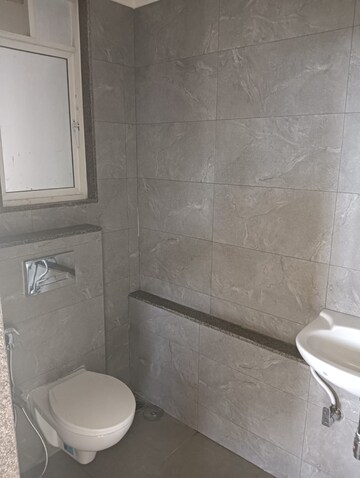 Bathroom in 1 BHK Apartment at Je And Vee Om Trimurti, Malad East – for Sale