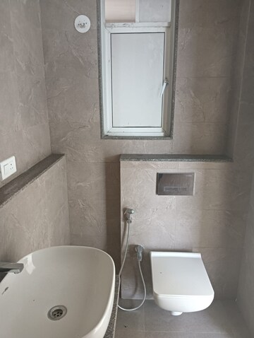 Bathroom in 1 BHK Apartment at Je And Vee Om Trimurti, Malad East – for Sale