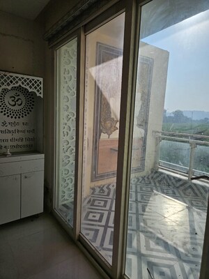 Balcony in 2 BHK Apartment at Mahagun Meadows, Sector 150 – for Rent