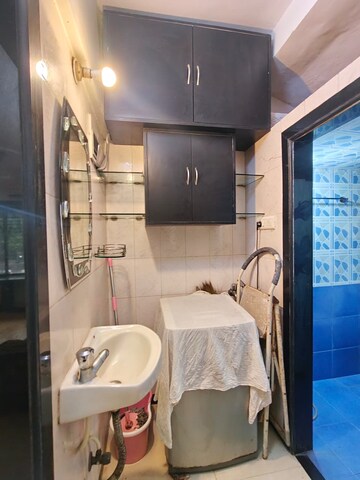 Bathroom in 1 BHK Apartment at Asmita Jyoti CHS, Malad West – for Rent
