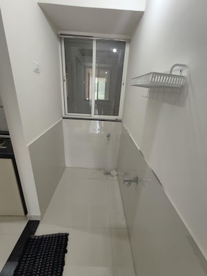 Staircase in 2 BHK Apartment at Megapolis Serenity, Hinjewadi – for Rent
