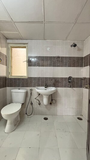Bathroom in 2 BHK Apartment at Divyansh Flora, Sector 16c Greater Noida – for Sale