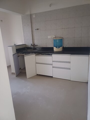 Kitchen in 2 BHK Apartment at Pisoli – for Sale