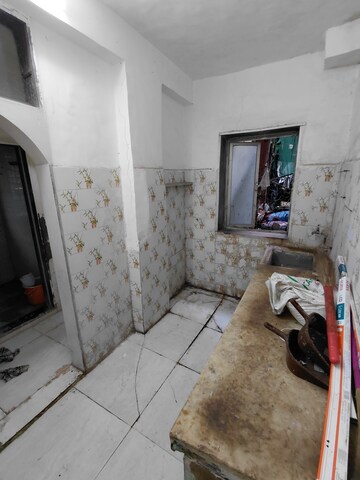 Kitchen in 1 BHK Apartment at Zohra Agadi Nagar, Andheri West – for Sale