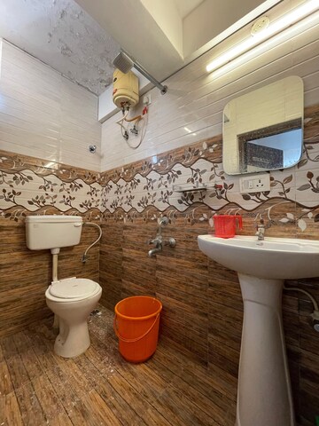 Bathroom in 2 BHK Apartment at Emmanuel Pearl, Rest House Road – for Rent