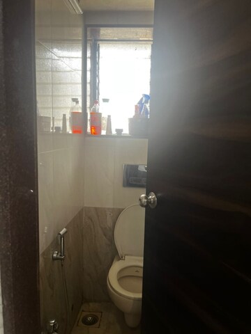 Bathroom in 1 BHK Apartment at Swastik Sarswati, Kopar Khairane – for Rent