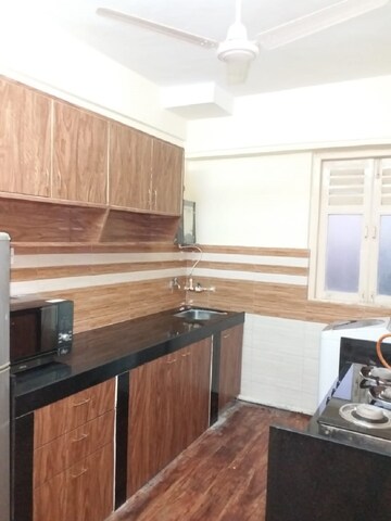 Kitchen in 1 BHK Apartment at Bandra West – for Rent