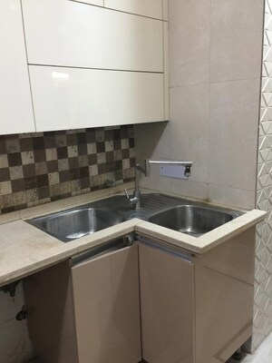 Kitchen in 3 BHK Builder Floor at Panchsheel Enclave – for Sale