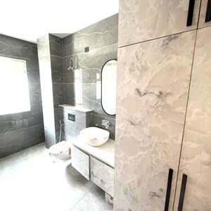 Bathroom in 3 BHK Builder Floor at Amolik Aster Woods, Sector 98 – for Sale