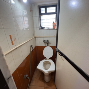 Bathroom in 1 BHK Apartment at Harsh CHS Tilak Nagar, Tilak Nagar – for Rent