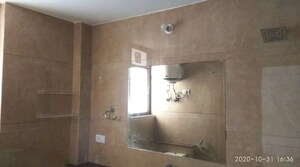 Bathroom in 4 BHK Apartment at Abhinandan CGHS, Sector 51 – for Rent