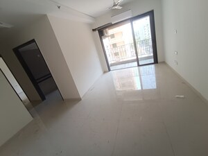 Living Room in 3 BHK Apartment at Regency Antilia Phase V Avana, Ulhasnagar – for Sale