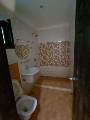 Bathroom in 3 BHK Apartment at Green Valley Heights, Dhakoli – for Rent