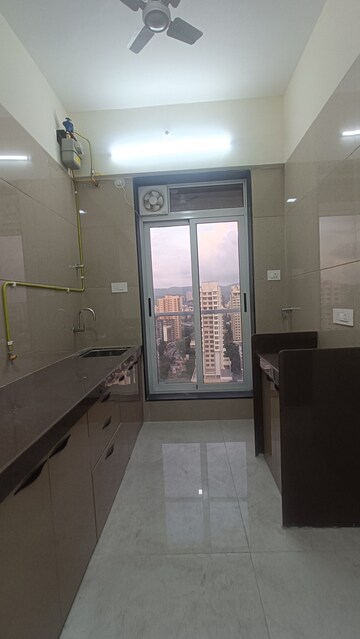 Kitchen in 1 BHK Apartment at Amar Om Vasudev CHS, Borivali West – for Rent