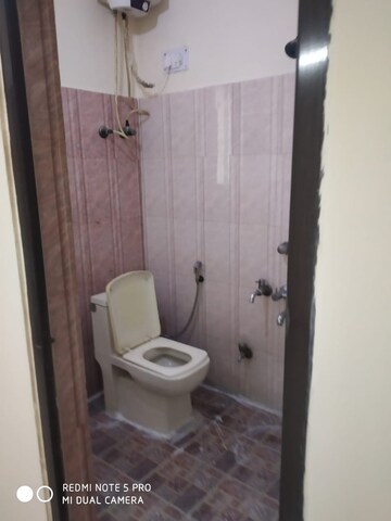 Bathroom in 2.5 BHK Apartment at Uma Cooperative Society, Mayur Vihar 1 – for Sale