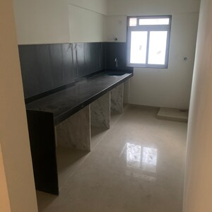 Kitchen in 1.5 BHK Apartment at Alliance Fortuna Blue, Dhuru Wadi – for Rent
