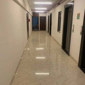 Building Lobby in 1.5 BHK Apartment at Alliance Fortuna Blue, Dhuru Wadi – for Rent