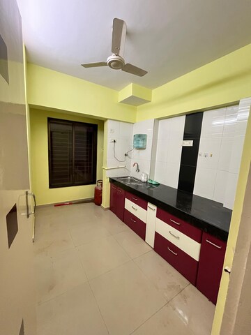 Kitchen in 2 BHK Apartment at Nivara Deepanjali CHSL, Vile Parle East – for Rent