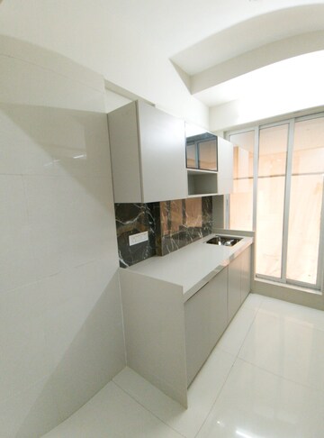 Kitchen in 1 BHK Apartment at Unique Ivana, Mira Road – for Sale