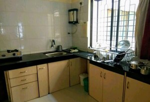 Kitchen in 2 BHK Apartment at Senapati Bapat Road – for Rent