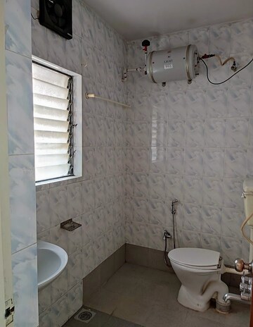 Bathroom in 2 BHK Apartment at Senapati Bapat Road – for Rent