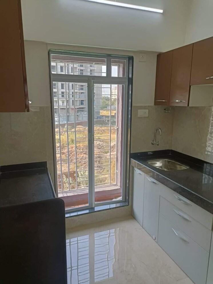 Kitchen, umiya-oasis 2 Bedroom 670 Sq.Ft. Apartment In Mira Road Thane 9229038