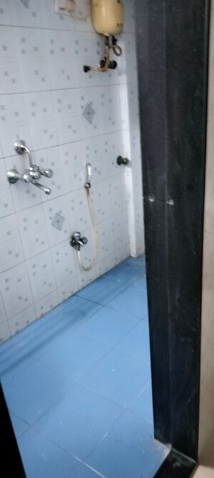 Bathroom in 1 BHK Apartment at Rohit Apartments, Andheri West – for Rent