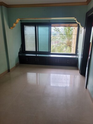 Living Room in 1 BHK Apartment at Kanchanjanga Lokdhara CHS, Kalyan East – for Rent