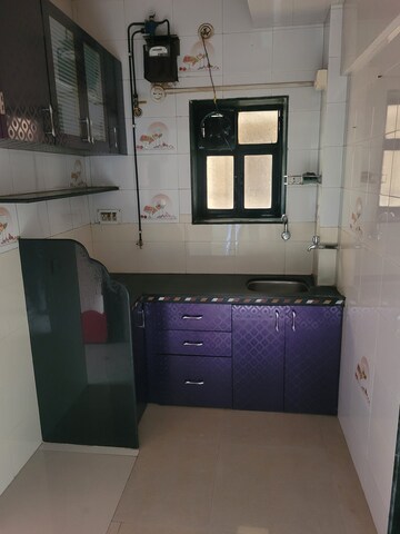 Kitchen in 1 BHK Apartment at Kanchanjanga Lokdhara CHS, Kalyan East – for Rent