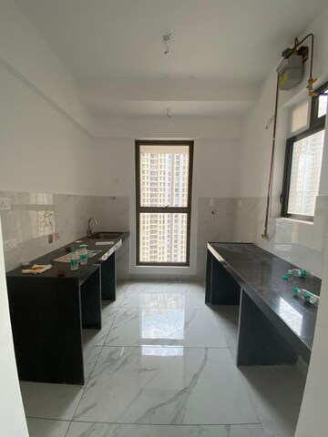 Kitchen in 1 BHK Apartment at Raymond Ten X Habitat, Pokhran Road No Two – for Rent