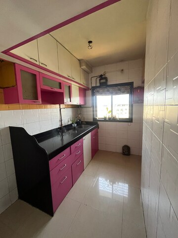 Kitchen in 2 BHK Apartment at Amrut Paradise, Kalwa – for Sale