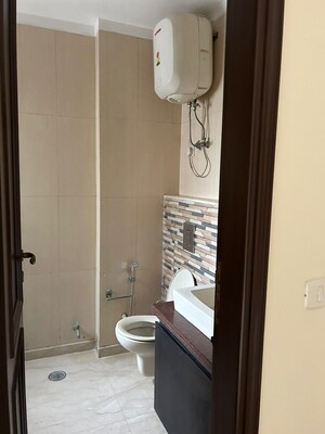 Bathroom in 3 BHK Apartment at S 27 Luxury Homes, Greater Kailash I – for Rent