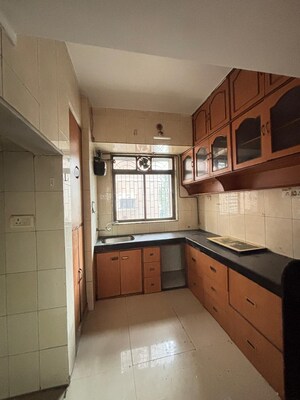 Kitchen in 2 BHK Apartment at Baba Homes Nerul, Nerul – for Rent