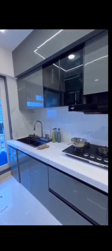 Kitchen in 4 BHK Apartment at Paradise Lifespaces Sai World City, New Panvel – for Sale