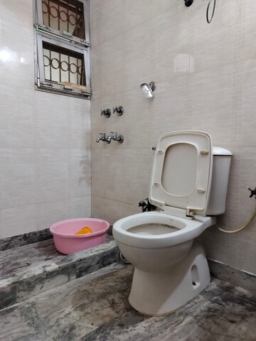 Bathroom in 4 BHK Apartment at Sarita Vihar – for Rent