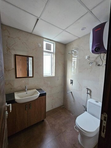 Bathroom in 3.5 BHK Builder Floor at M3M Soulitude, Sector 89 – for Rent