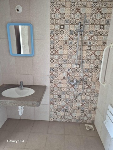Bathroom in 1 BHK Apartment at Forest Trails Cascade And Crescent, Bhugaon – for Rent