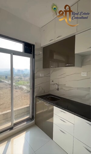 Kitchen in 1.5 BHK Apartment at Vastu Hills, Badlapur East – for Sale