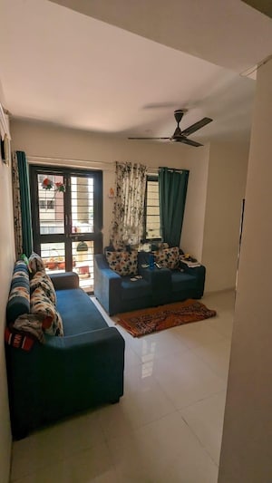 Living Room in 2 BHK Apartment at Kohinoor Sapphire, Tathawade – for Rent
