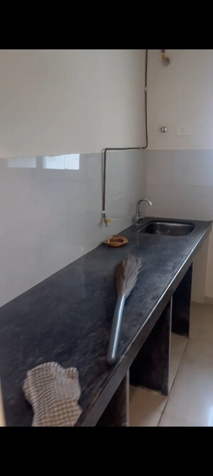 Kitchen in 2 BHK Apartment at Ashar Axis, Majiwada – for Rent