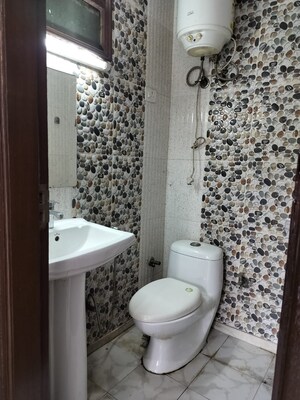 Bathroom in 2 BHK Apartment at Madangir – for Sale