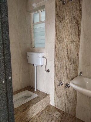 Bathroom in 2 BHK Apartment at Paranjape Azure, Tathawade – for Sale