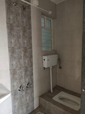 Bathroom in 2 BHK Apartment at Paranjape Azure, Tathawade – for Sale
