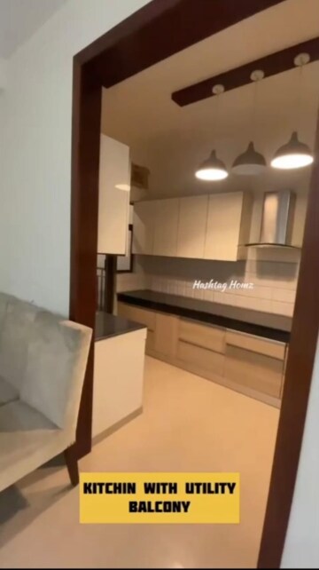 Kitchen in 3 BHK Apartment at Shri Radha Aqua Garden, Sector 16b Greater Noida – for Sale