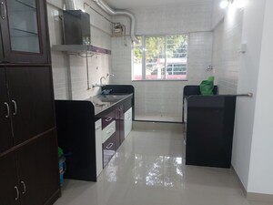 Kitchen in 3 BHK Apartment at Kumar Parisar, Kothrud – for Rent
