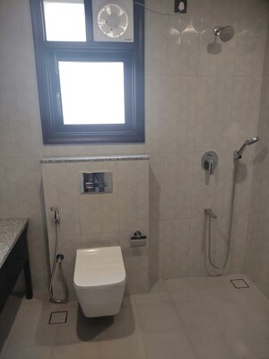 Bathroom in 4 BHK Apartment at Eros Edenwood Towers, Lakkarpur – for Sale