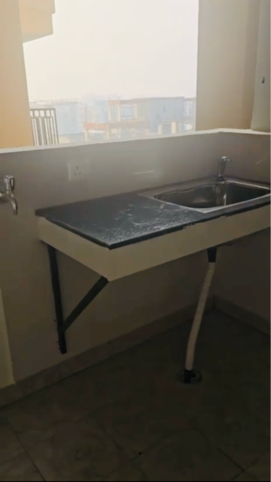 Kitchen in 3.5 BHK Apartment at SKA Divya Towers, Panchsheel Green – for Sale