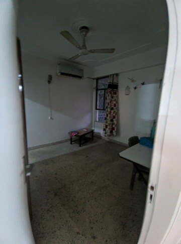 Living Room in 2 BHK Apartment at Eros Southend Apartments, Charmwood Village – for Rent