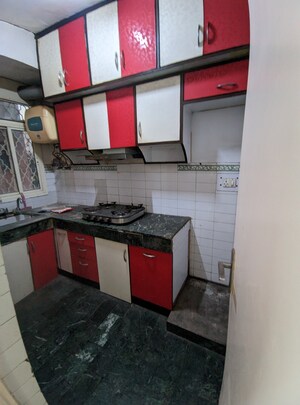 Kitchen in 2 BHK Apartment at Eros Southend Apartments, Charmwood Village – for Rent